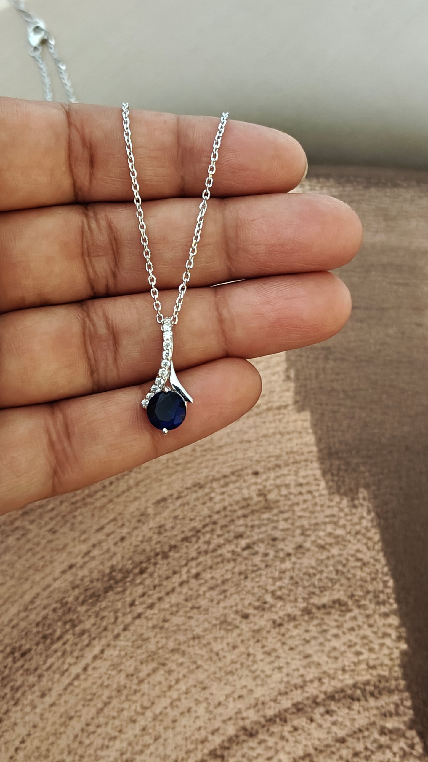 SILVER BLUE SAPPHIRE AND DIAMOND ACCENT PENDANT