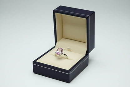 OVAL-CUT PINK SOLITAIRE RING