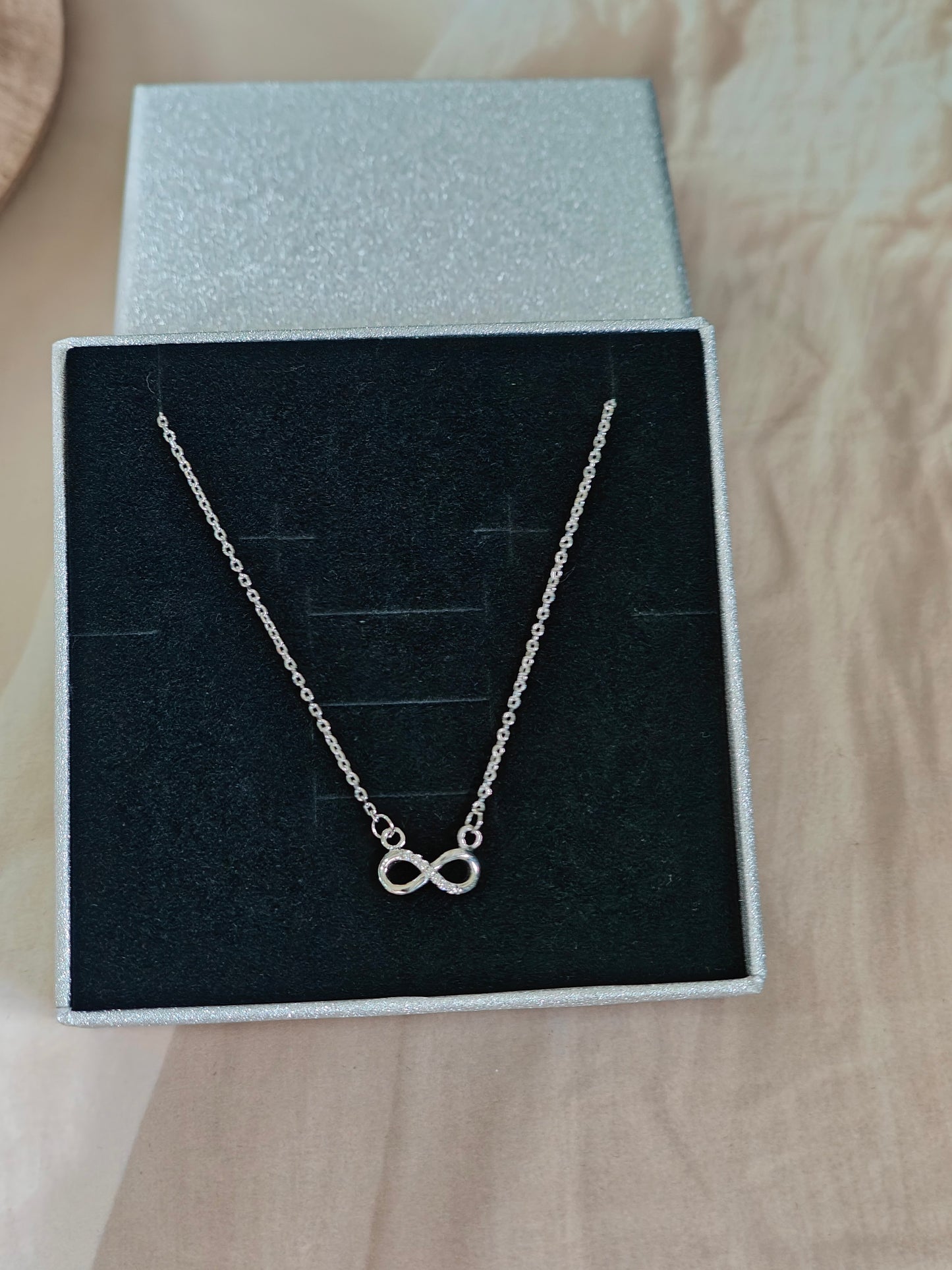 STERLING SILVER INFINITY NECKLACE