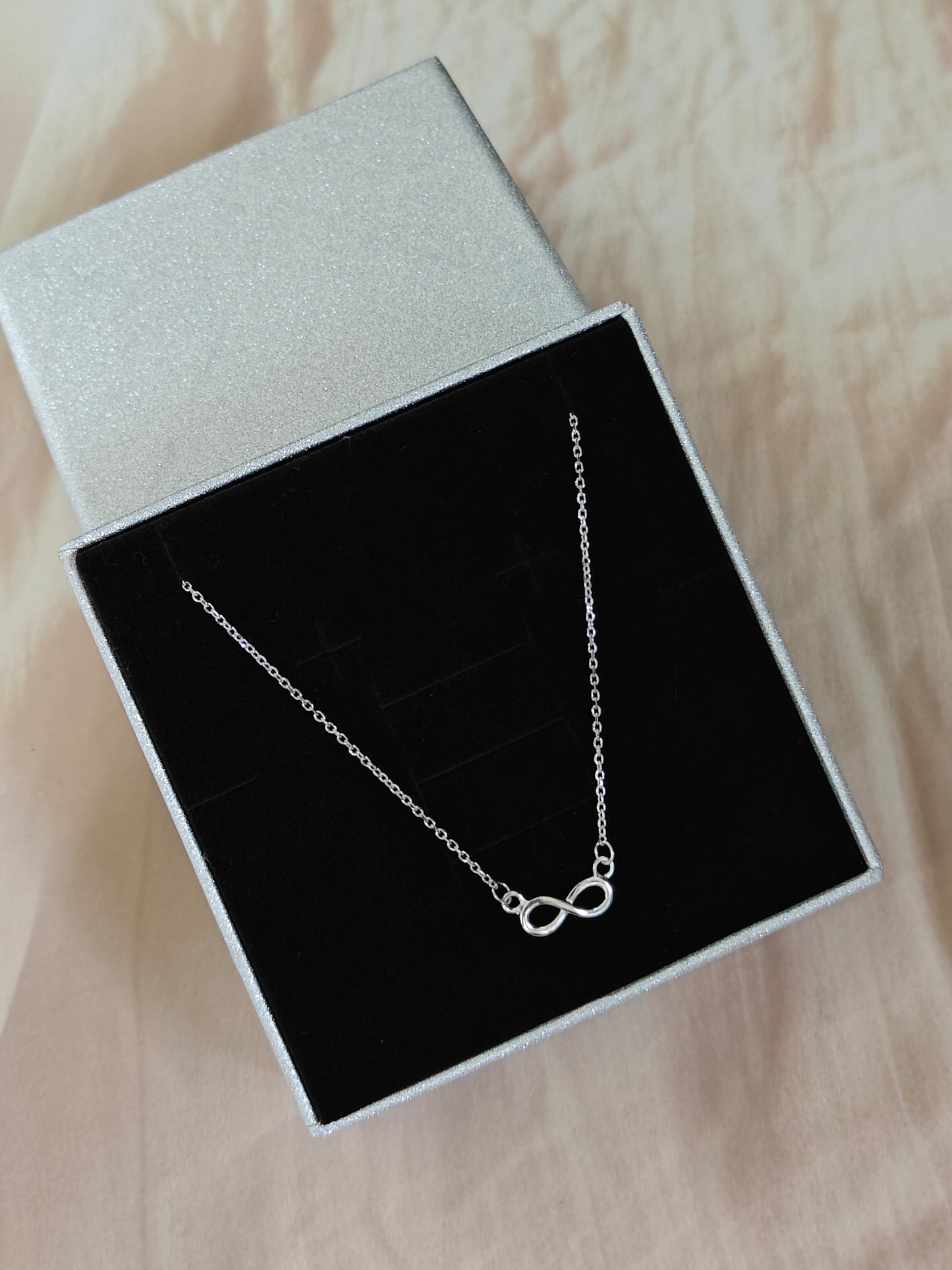 STERLING SILVER INFINITY NECKLACE