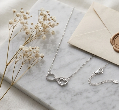 Infinity Symbol Intertwined with a heart pendant